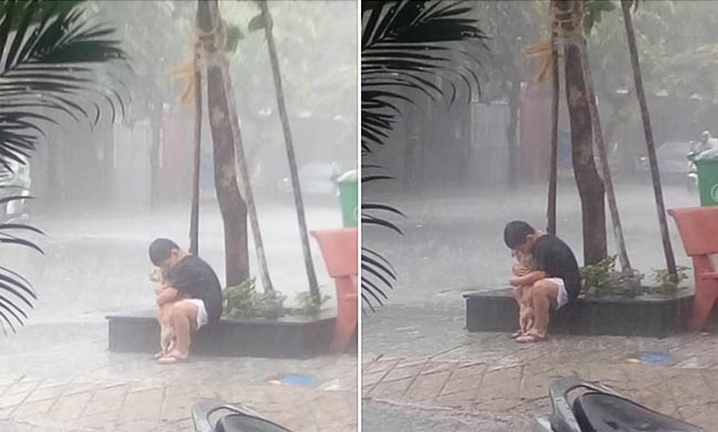 Khoảnh khắc cậu bé ôm lấy chú chó nhỏ giữa cơn mưa: Không sao đâu, có anh ở đây mà!